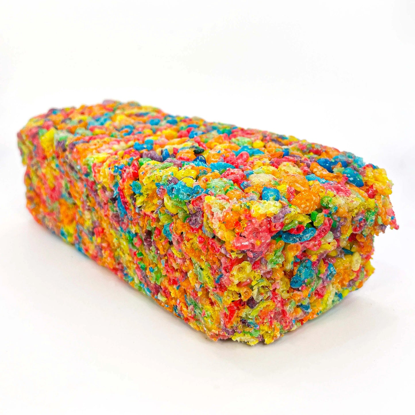 Close-up of SasquaTHCa Rainbow Rice Cereal Bar, showcasing its crispy texture and fruity rainbow-infused THCa edible.
