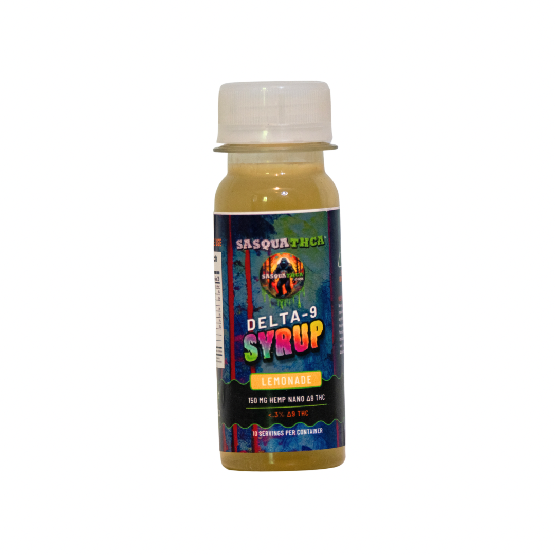 Front view of SasquaTHCa Lemonade Syrup bottle, featuring a bright yellow label design that highlights the refreshing and tangy lemonade flavor of this Delta-9 infused liquid edible.