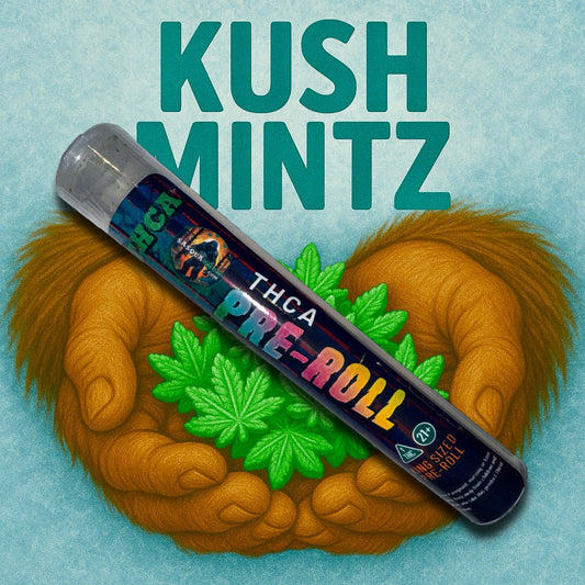 THCA pre-roll with 'Kush Mintz' branding on a light blue background w sasquatch hands cradling marijuana shaped mints